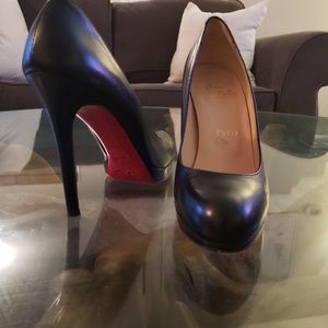 Christian Louboutin round toe pumps